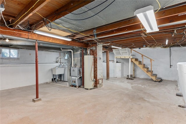 510 N Merchant St, Effingham, IL 62401 - basement featuring heating unit, gas water heater, stairway, and a sink