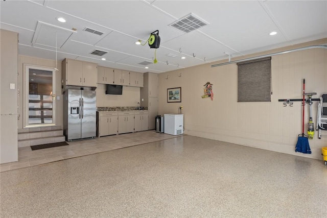 1003 Flame Ave, Effingham, IL 62401 - garage with stainless steel fridge and recessed lighting