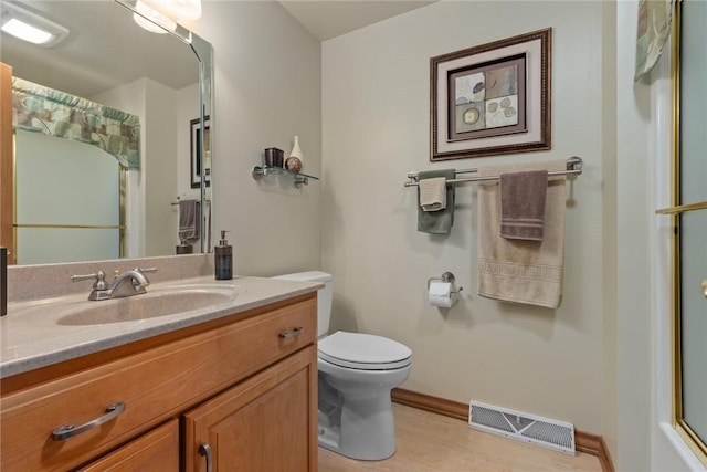 1003 Flame Ave, Effingham, IL 62401 - full bath with a shower with shower curtain, vanity, and wood finished floors
