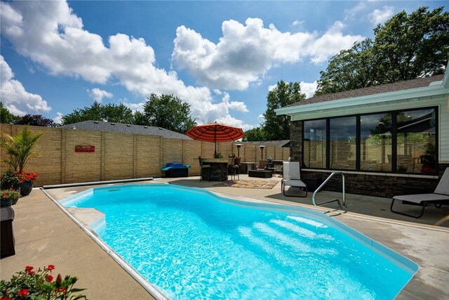 1003 Flame Ave, Effingham, IL 62401 - view of swimming pool with a patio and a fenced backyard