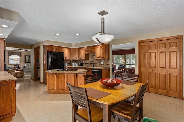 1003 Flame Ave, Effingham, IL 62401 - dining area featuring ceiling fan, light wood finished floors, a textured ceiling, and recessed lighting