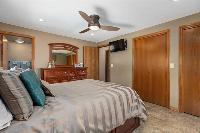 1003 Flame Ave, Effingham, IL 62401 - bedroom featuring multiple closets, a ceiling fan, and recessed lighting