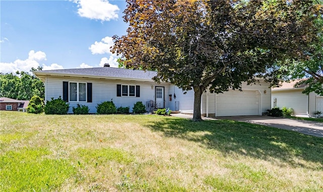 1059 Columbia Dr, Decatur, IL 62522 - ranch-style home featuring driveway, a front lawn, and an attached garage