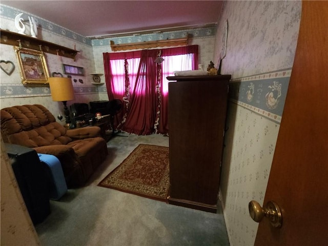 carpeted living area with wallpapered walls