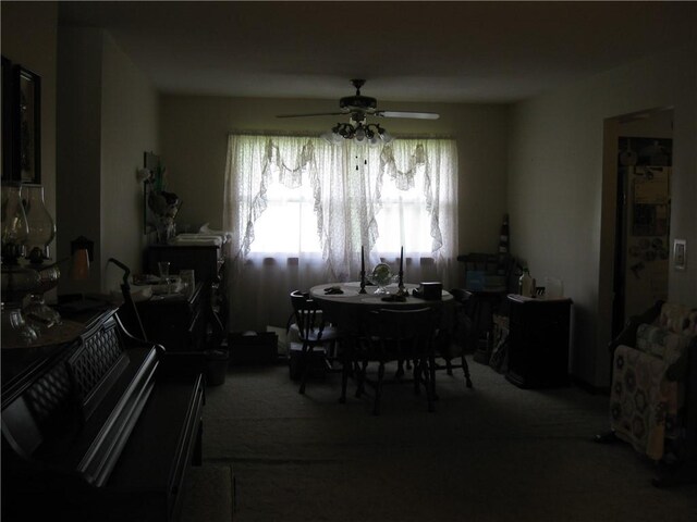 517 Coolidge Ave, Charleston, IL 61920 - carpeted dining room featuring a ceiling fan