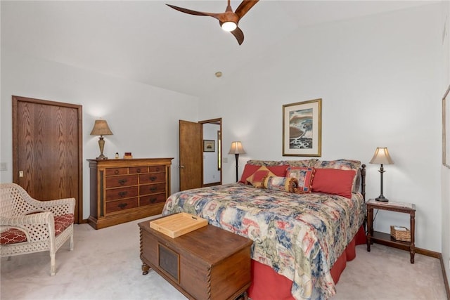 bedroom featuring baseboards, carpet flooring, a ceiling fan, and vaulted ceiling