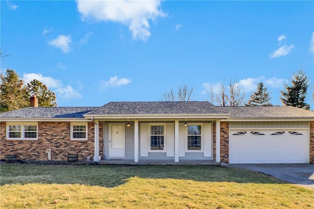 ranch-style house with aphalt driveway, roof with shingles, a front yard, a garage, and brick siding