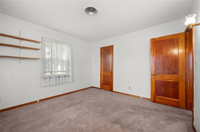 801 N Central Ave, Paris, IL 61944 - unfurnished bedroom with carpet and baseboards