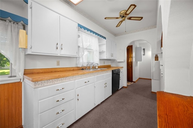 801 N Central Ave, Paris, IL 61944 - kitchen with light countertops, black dishwasher, arched walkways, white cabinetry, and ornamental molding
