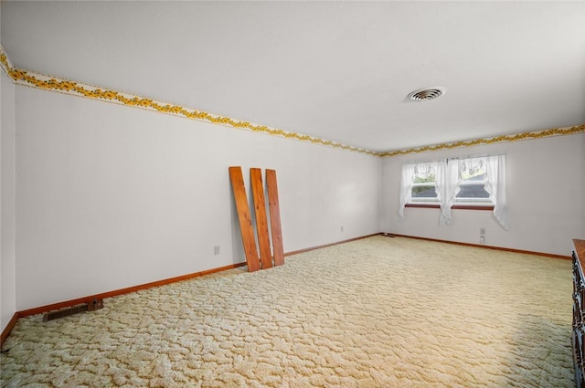 801 N Central Ave, Paris, IL 61944 - empty room featuring baseboards and carpet flooring