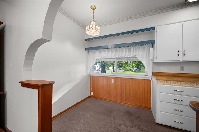 801 N Central Ave, Paris, IL 61944 - unfurnished dining area with dark carpet and baseboards