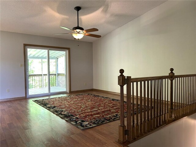3002 N Charlotte St, Effingham, IL 62401 - unfurnished room featuring ceiling fan, wood finished floors, baseboards, and a textured ceiling
