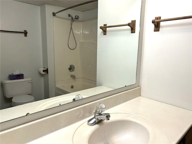 3002 N Charlotte St, Effingham, IL 62401 - full bathroom with vanity, toilet, and bathtub / shower combination