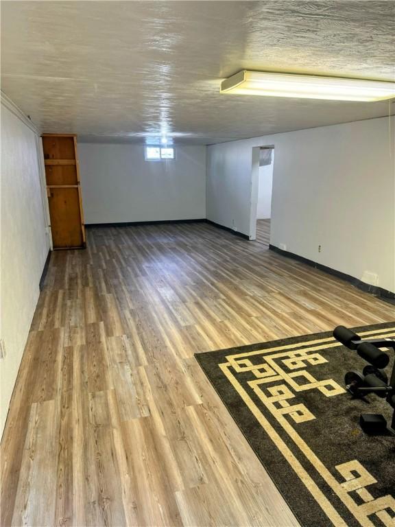 basement with wood finished floors