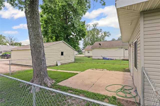 1609 10th St, Charleston, IL 61920 - fenced backyard with a patio
