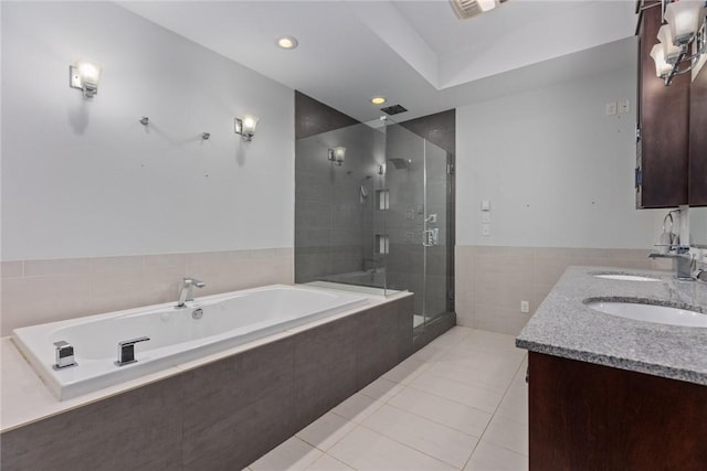 2098 2070th Ave, Saint Elmo, IL 62458 - full bath with tile patterned floors, a bath, a shower stall, double vanity, and tile walls