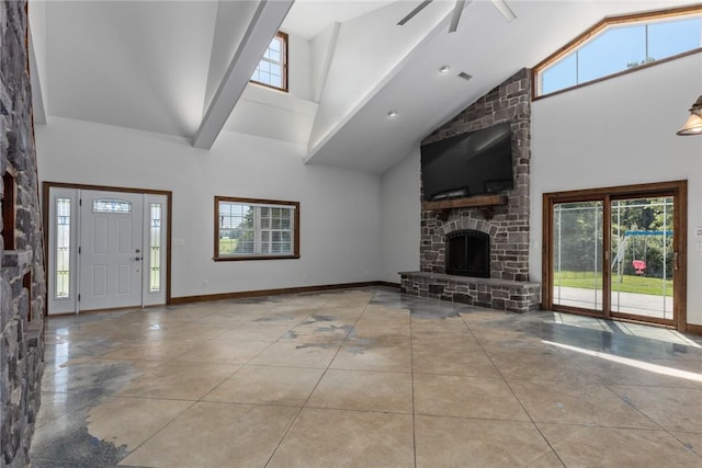 2098 2070th Ave, Saint Elmo, IL 62458 - unfurnished living room with high vaulted ceiling, a large fireplace, and ceiling fan