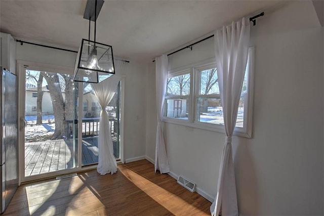 interior space with hardwood / wood-style flooring