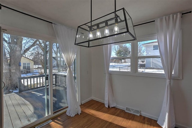 dining area featuring hardwood / wood-style floors