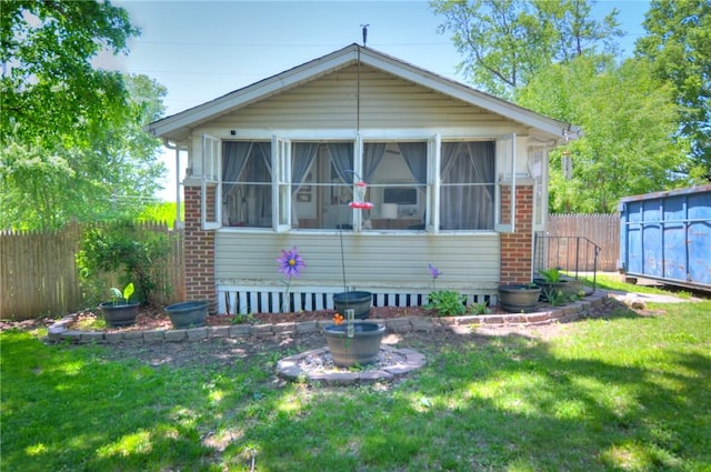 805 N 33rd St, Decatur, IL 62521 - bungalow-style home featuring a sunroom