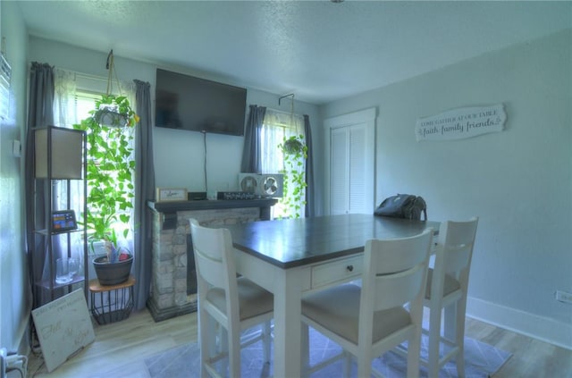 805 N 33rd St, Decatur, IL 62521 - dining area featuring plenty of natural light, light wood-type flooring, and baseboards