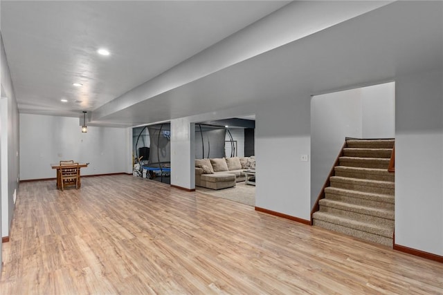 basement featuring light wood-type flooring