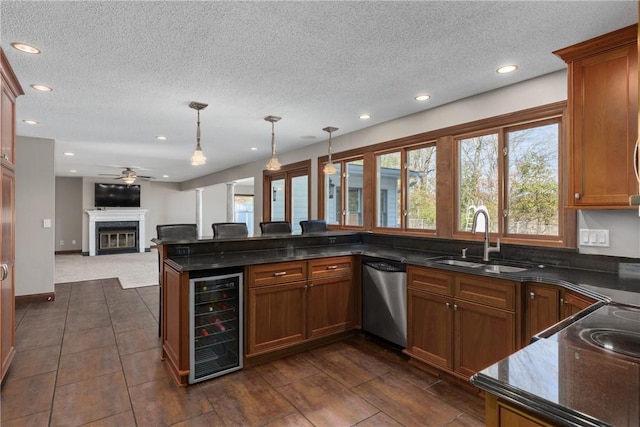 1025 Cardinal Dr, Effingham, IL 62401 - kitchen featuring beverage cooler, dishwasher, open floor plan, brown cabinetry, and recessed lighting