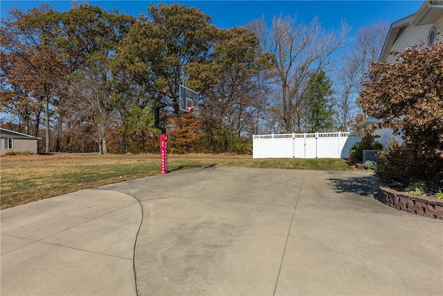 view of patio / terrace with basketball hoop