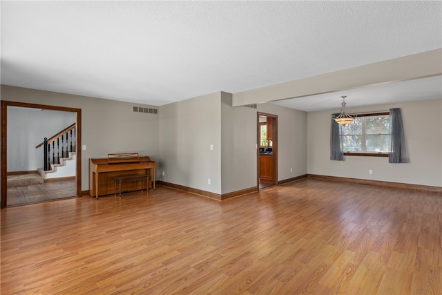 living room with light hardwood / wood-style floors