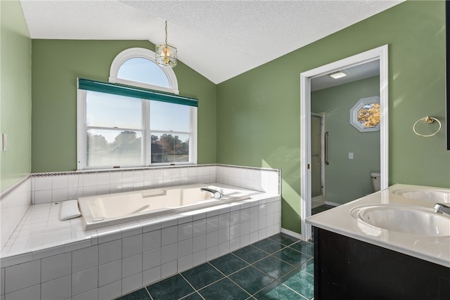 full bathroom with tile patterned floors, vanity, a textured ceiling, toilet, and lofted ceiling