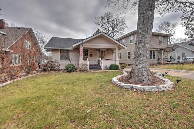 view of front facade with a porch and a front yard