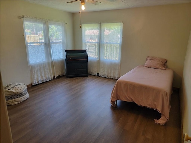 410 E Ninth St, Pana, IL 62557 - bedroom featuring wood finished floors and a ceiling fan