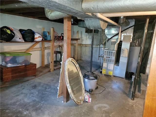 410 E Ninth St, Pana, IL 62557 - unfinished basement with gas water heater