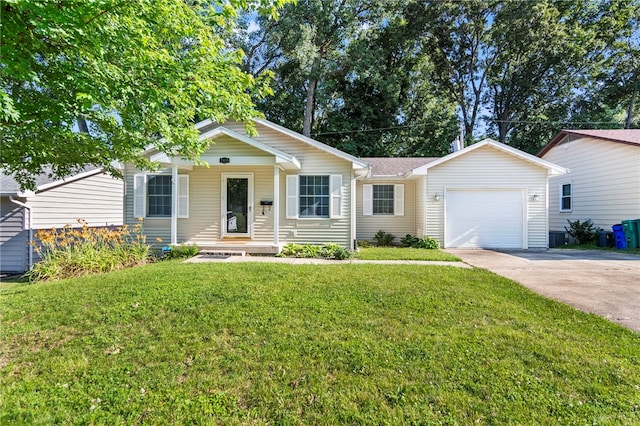 2819 E Wood St, Decatur, IL 62521 - ranch-style house featuring concrete driveway, an attached garage, and a front lawn