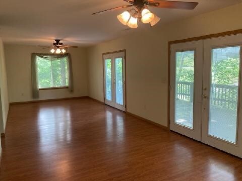 13859 Lake Jasper S Ave, Newton, IL 62448 - spare room featuring french doors, wood finished floors, and ceiling fan