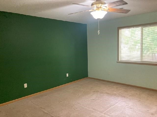 13859 Lake Jasper S Ave, Newton, IL 62448 - empty room featuring light carpet and ceiling fan