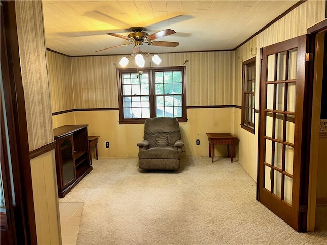 8 Noyes Ct, Mattoon, IL 61938 - sitting room featuring ceiling fan, light colored carpet, ornamental molding, and wallpapered walls