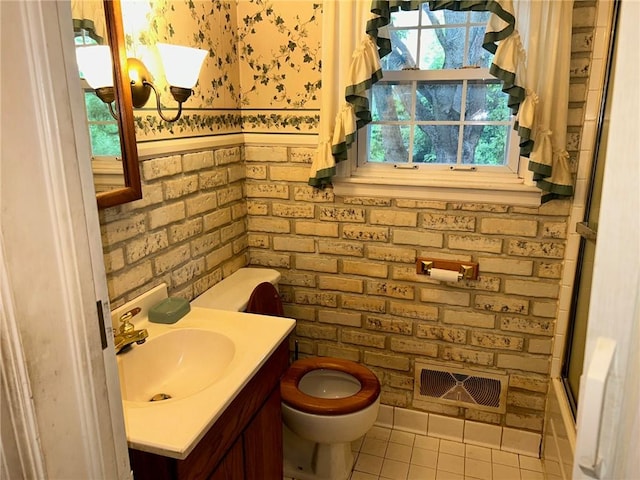 8 Noyes Ct, Mattoon, IL 61938 - bathroom with tile patterned floors and vanity