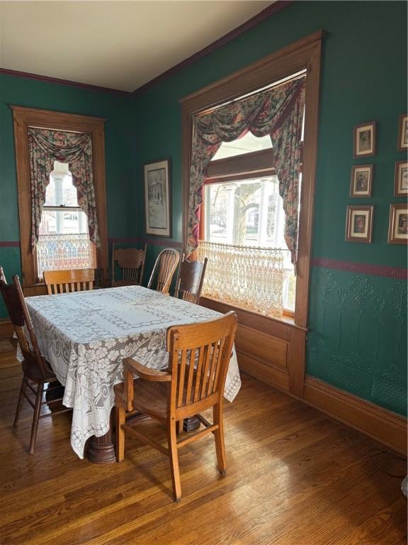 dining area featuring wood-type flooring