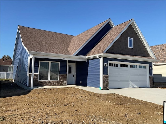 craftsman house featuring a garage