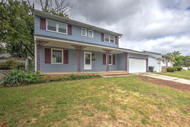 view of front of house featuring a front yard and a garage