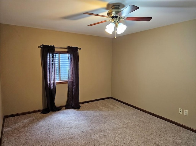 504 W Walnut St, Teutopolis, IL 62467 - spare room featuring light carpet and a ceiling fan