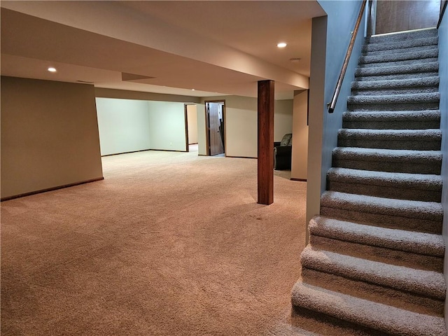 504 W Walnut St, Teutopolis, IL 62467 - finished basement featuring stairway, carpet flooring, and recessed lighting