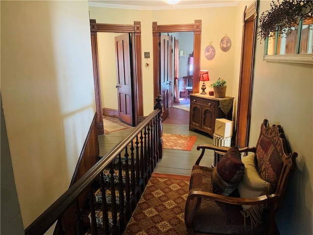 corridor featuring ornamental molding