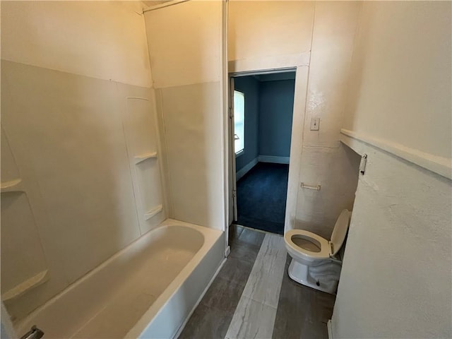 bathroom featuring toilet