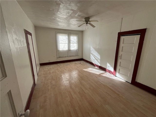 unfurnished room with light hardwood / wood-style flooring