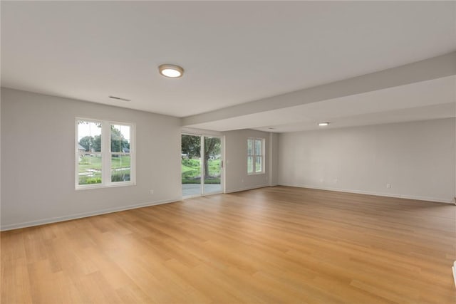 11311 E Thistlewood Ln, Effingham, IL 62401 - empty room featuring light wood finished floors and baseboards