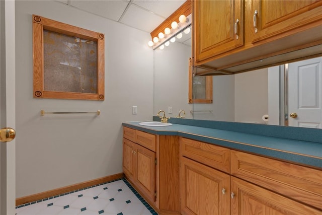 11311 E Thistlewood Ln, Effingham, IL 62401 - bathroom featuring vanity, tile patterned floors, and a drop ceiling