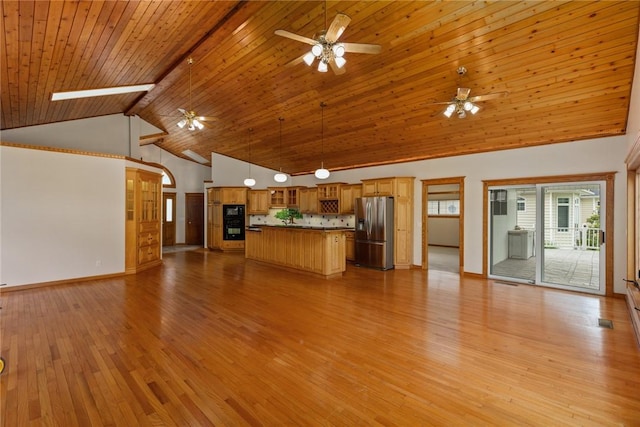 11311 E Thistlewood Ln, Effingham, IL 62401 - unfurnished living room featuring ceiling fan, high vaulted ceiling, light wood-style flooring, and a wooden ceiling with exposed beams