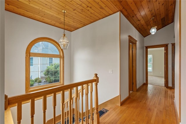11311 E Thistlewood Ln, Effingham, IL 62401 - corridor with an upstairs landing, wood ceiling, a chandelier, light wood finished floors, and vaulted ceiling